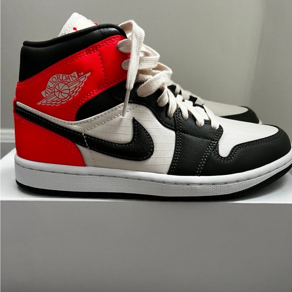 Air Jordan 1 Mid Newsprint, brand new, never worn, women’s size 7